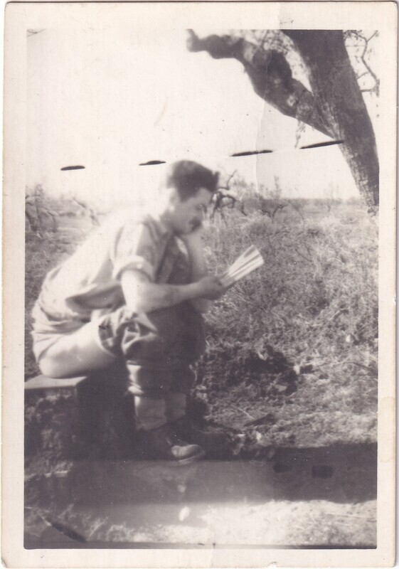 Bud Peyton reading on the toilet, front