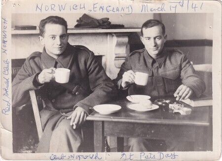 A photo of Victor and W.I. (Bill) Hann seated, drinking tea or coffee, and smoking at the Red Shield Club in Norwich, England