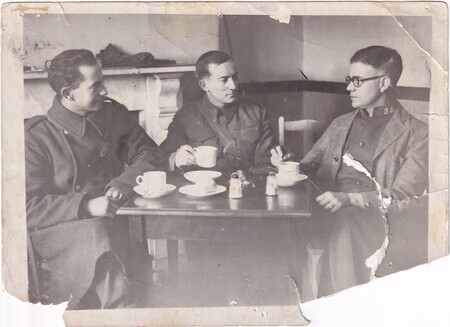 A photo of Victor and W.I. (Bill) Hann seated and drinking tea or coffee with a Salvation Army Officer at the Red Shield Club in Norwich, England