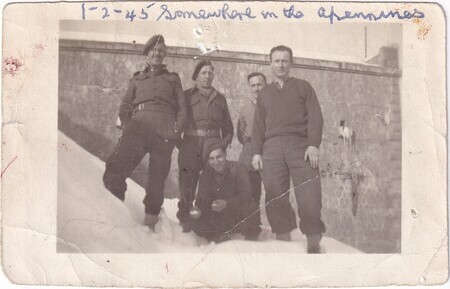 A photo of a group of Newfoundland soldier taken somewhere in the Apennine mountains of Italty including W.I. (Bill) Hann crouching in front